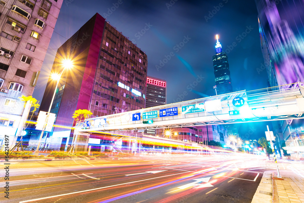 Fototapeta premium Car light trails and urban landscape in modern city