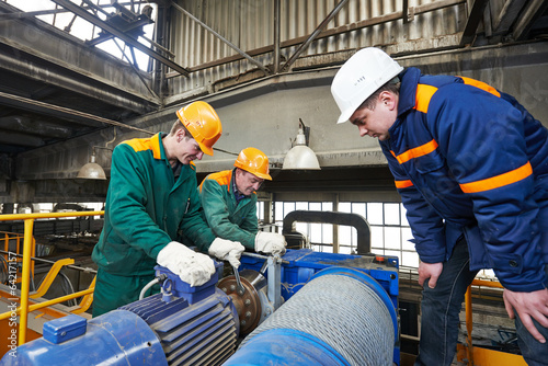 industry workers repairman with spanner photo