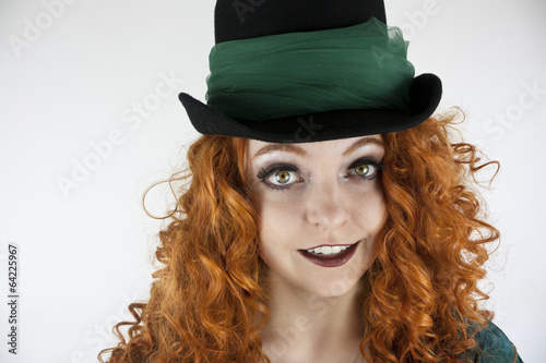Irish woman with red hair wearing hat © cindygoff