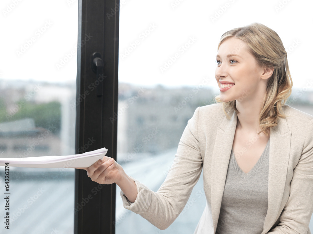 happy woman with documents