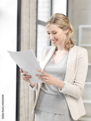 happy woman with documents