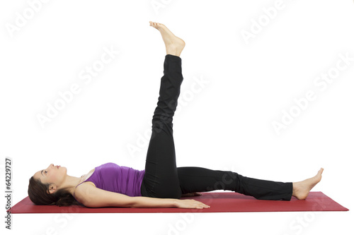 Woman doing leg raising exercises