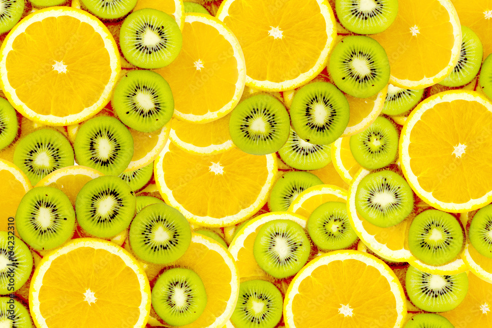 Many slices of kiwi fruit and orange fruit, Fresh kiwis and oran Many slices of kiwi fruit and orange fruit, Fresh kiwis and oran