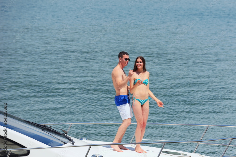 Fototapeta premium young couple on yacht