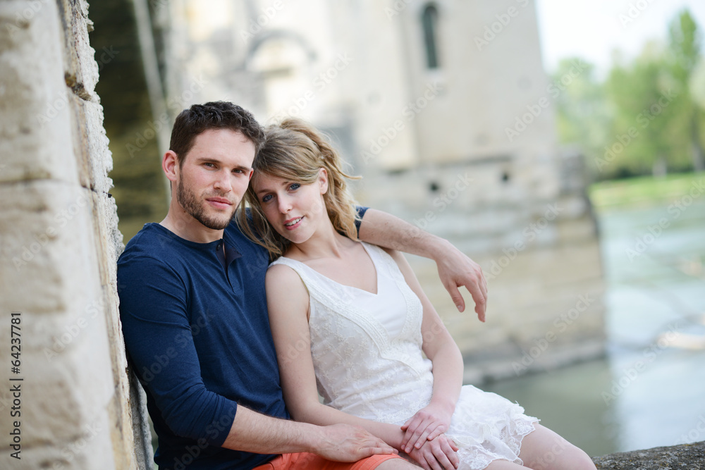 cheerful young couple on holiday sightseeing and visiting cheerful young couple on holiday sightseeing and visiting