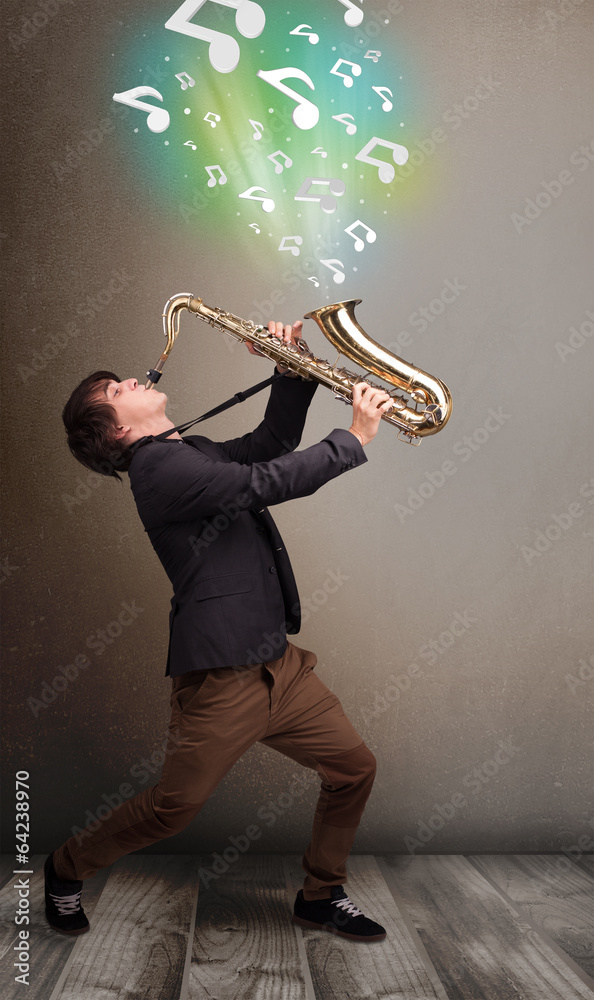 Young musician playing on saxophone while musical notes explodin Young musician playing on saxophone while musical notes explodin