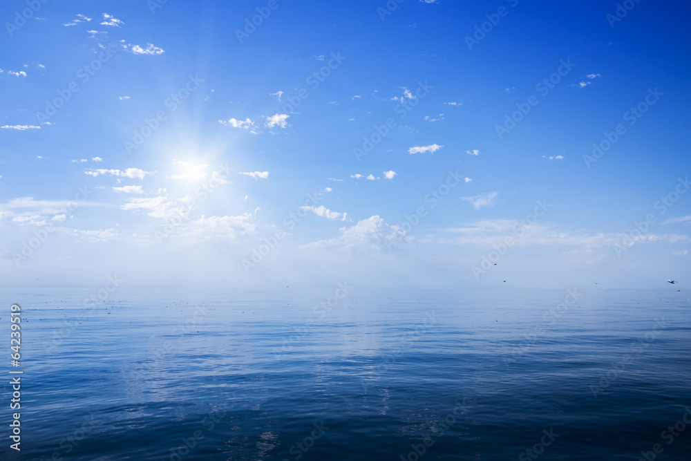 Beautiful sunny day with blue sky over the sea.