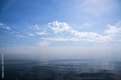 Beautiful sunny day with blue sky over the sea.