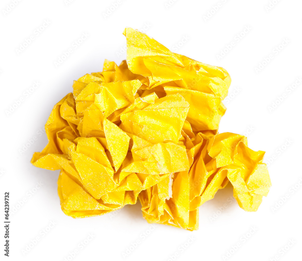 Screwed up piece of yellow paper Screwed up piece of yellow paper
