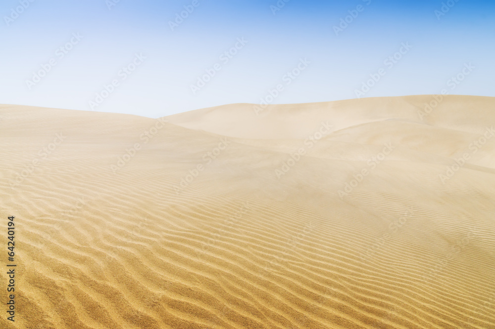 Sand dunes on the beach in Maspalomas. Sand dunes on the beach in Maspalomas.