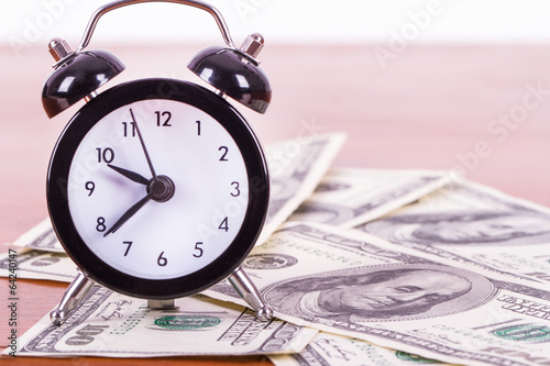 Alarm Clock and Banknotes