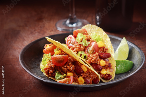 Tex-mex cuisine with corn tacos with meat