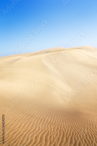 Fototapeta Naklejka Na Ścianę i Meble -  Sand dunes on the beach in Maspalomas.