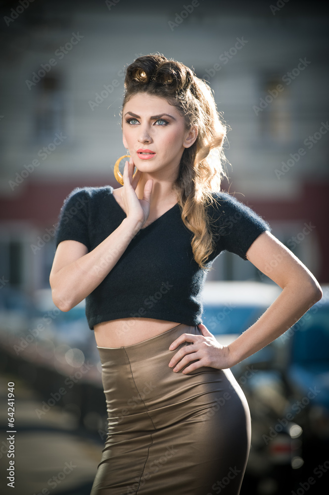 Attractive young woman in a urban fashion shot. Beautiful girl