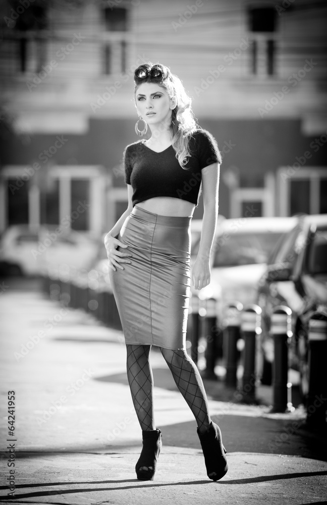 Attractive young woman in a urban fashion shot. Beautiful girl