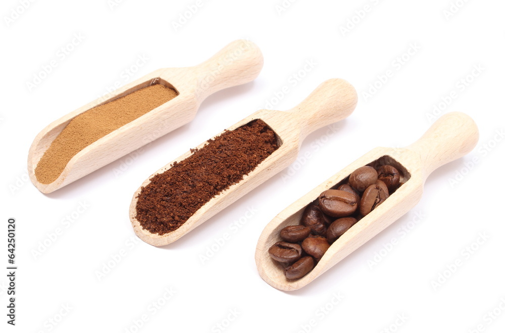 Grains, ground and instant coffee on wooden spoon Grains, ground and instant coffee on wooden spoon