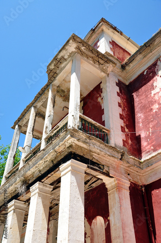 old dilapidated building with balconies