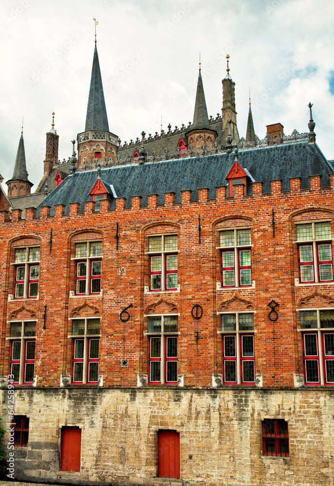 Fototapeta premium Houses along the canals of Brugge or Bruges, Belgium