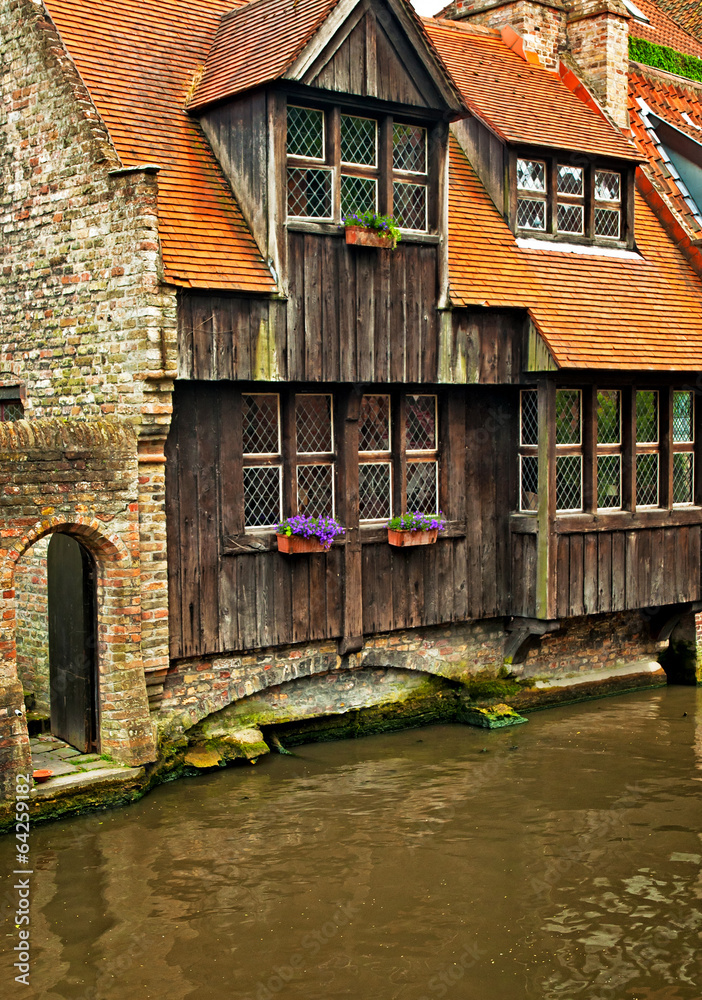 Fototapeta premium Houses along the canals of Brugge or Bruges, Belgium
