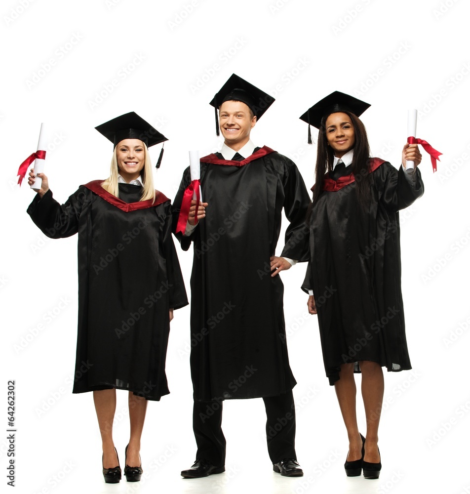 Multi ethnic group of graduated young students isolated on white Multi ethnic group of graduated young students isolated on white
