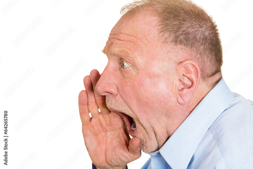 Side view portrait Angry older man isolated on white background Side view portrait Angry older man isolated on white background