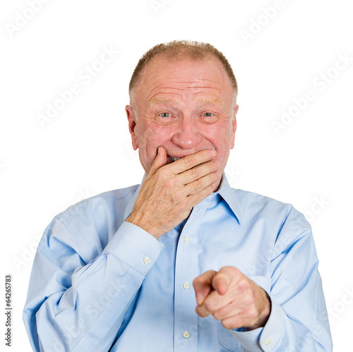 Portrait senior old man laughing pointing finger at you