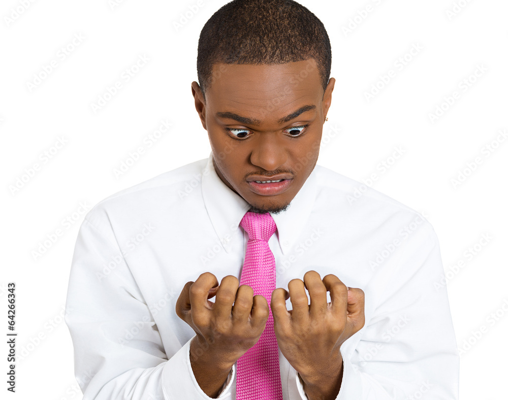 OCD. Portrait of obsessive compulsive person checking his nails Stock