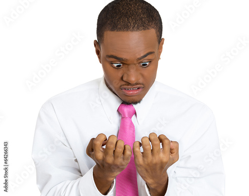 OCD. Portrait of obsessive compulsive person checking his nails 