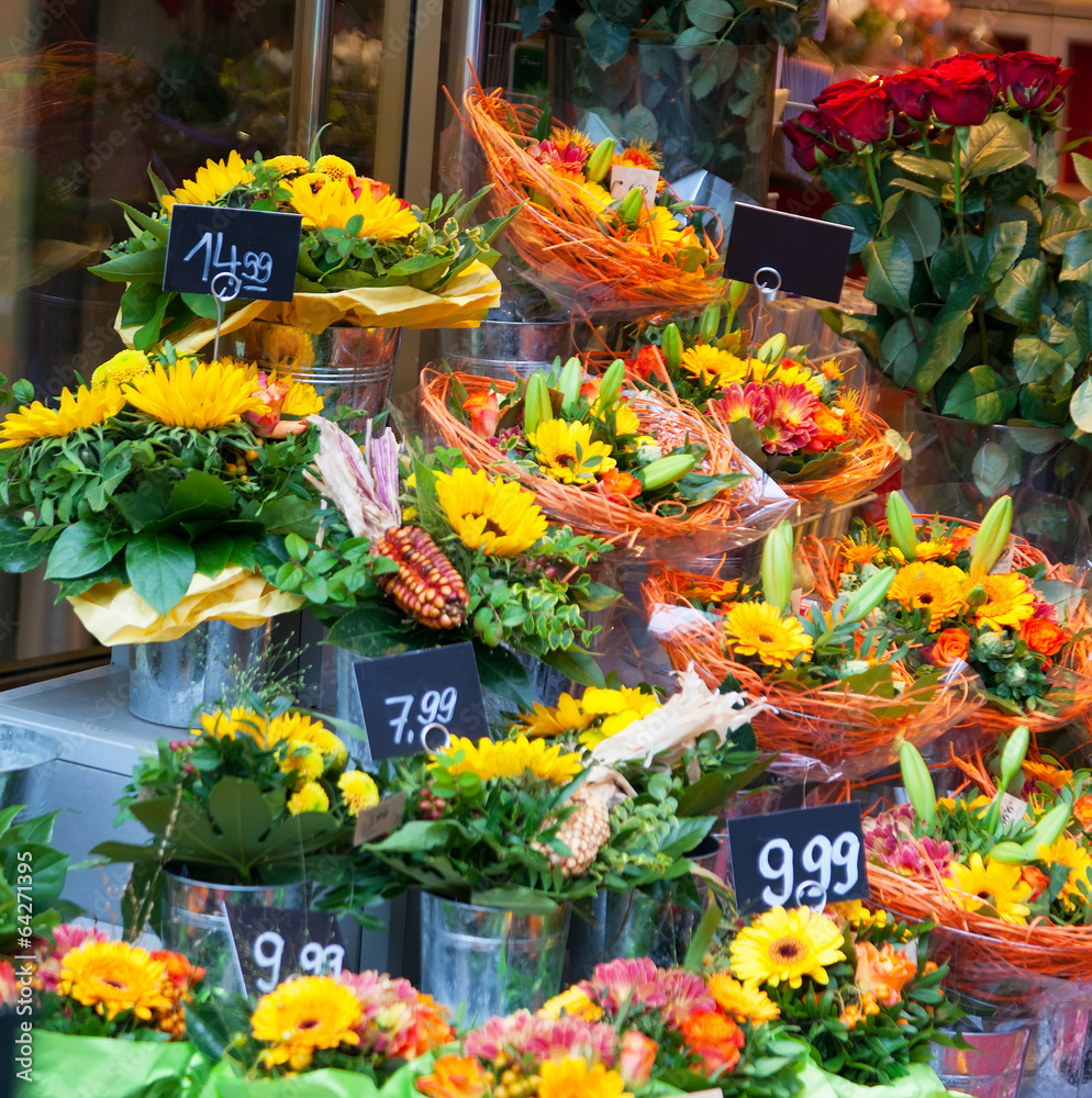 Street show-window of flower shop in Europe