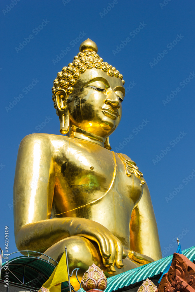 The Big golden buddha statue on Chiangrai, Thailand The Big golden buddha statue on Chiangrai, Thailand