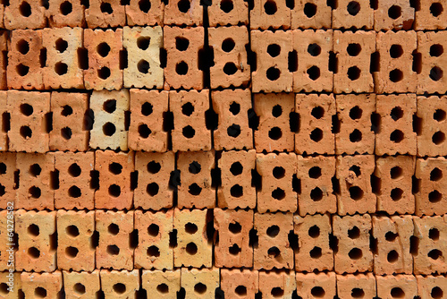 Stack of red bricks, bricks used for building construction