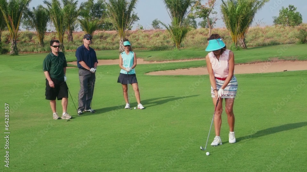 Happy friends playing in golf club, sport, leisure, fun, hobby Happy friends playing in golf club, sport, leisure, fun, hobby