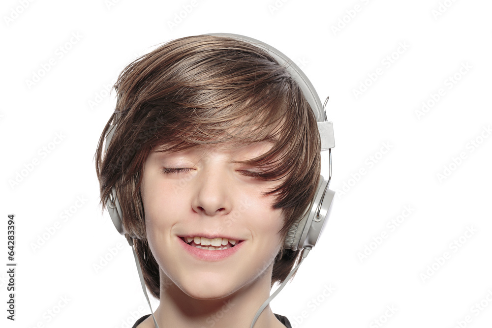 smiling cute teenager boy with headphones, isolated on white smiling cute teenager boy with headphones, isolated on white