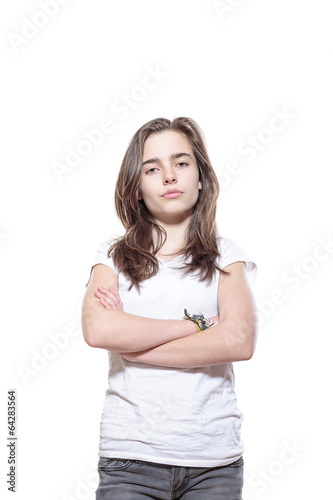 strict looking female teenager with crossed arms, isolated on wh © Armin Staudt