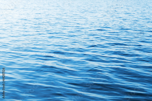 Fototapeta Naklejka Na Ścianę i Meble -  Blue water photo background with soft waves