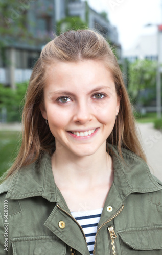 Portrait of a young woman in a field jacket