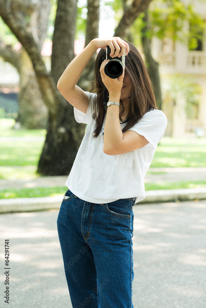 Girl take photo with rangerfinder camera