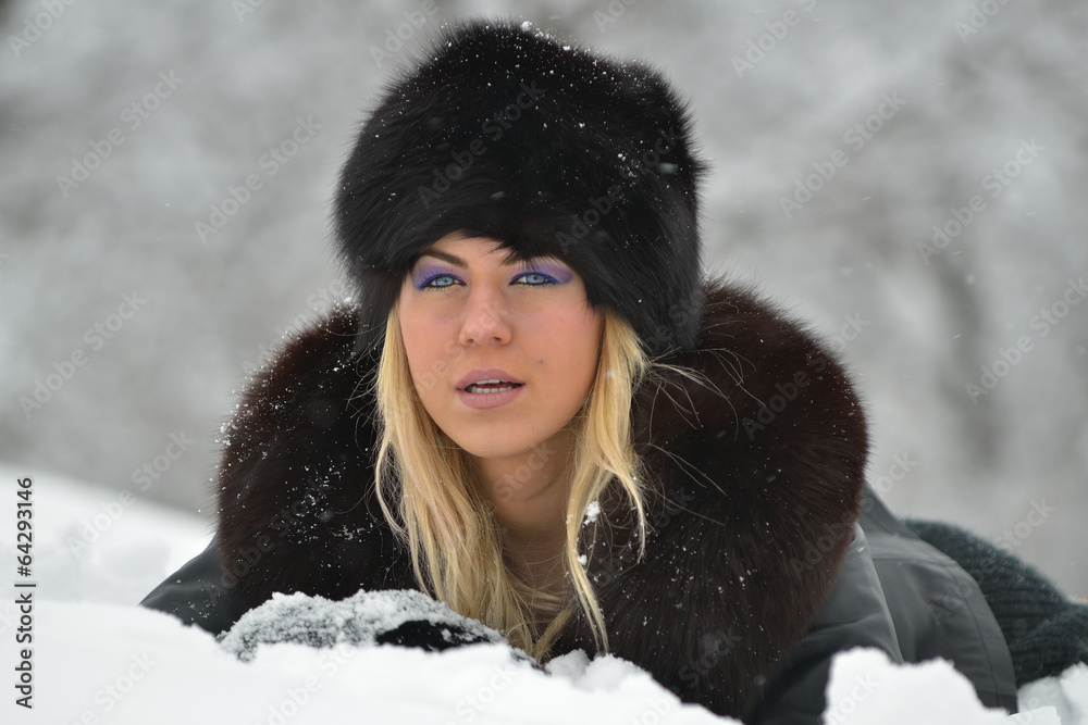 Smiling woman portrait outdoor in winter Smiling woman portrait outdoor in winter