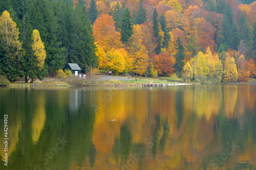 Autumn landscape in the mountains on the lake