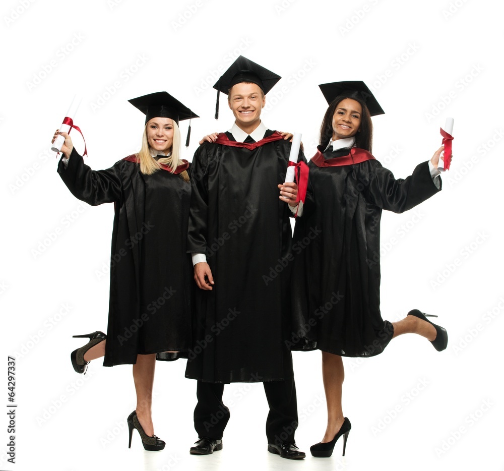 Multi ethnic group of graduated young students isolated on white Multi ethnic group of graduated young students isolated on white