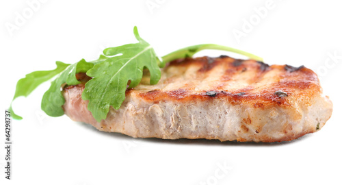 Grilled steak with fresh arugula leaves isolated on white
