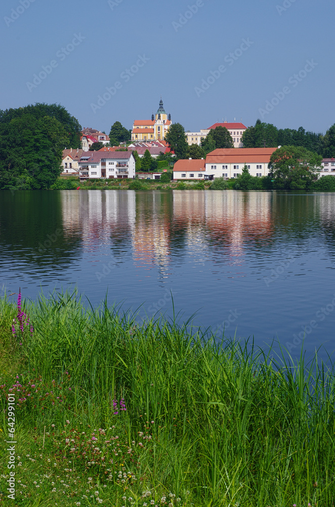 Landscape with pond and church in the background, Czech Republic