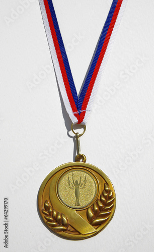 Gold medal on white background