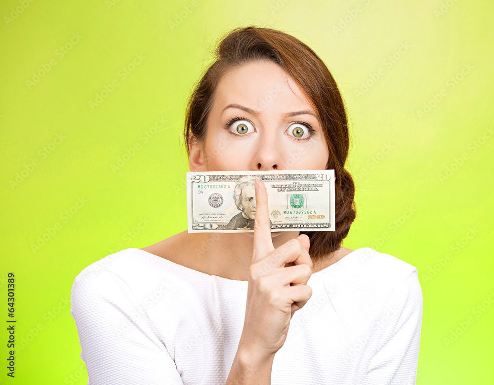 Corruption, woman with dollars and quiet gesture on her mouth Corruption, woman with dollars and quiet gesture on her mouth