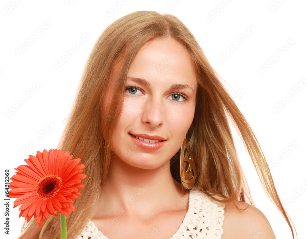 A beautiful young woman with a flower