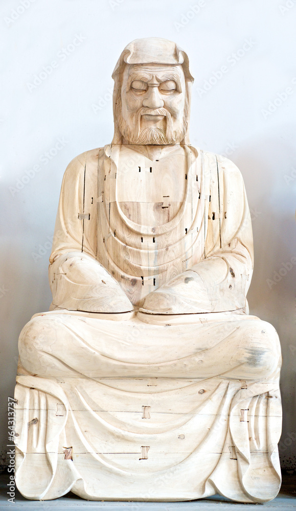 Obraz premium Wooden Buddha