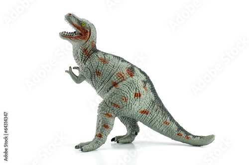 Tyrannosaurus toy isolated on white © nicescene