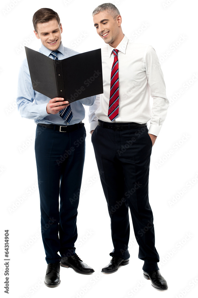Two businessmen discussing isolated on white Two businessmen discussing isolated on white