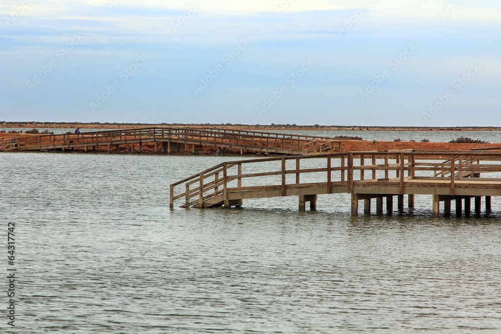 wooden jetty over a calm sea