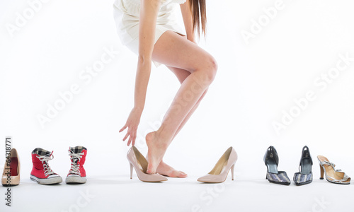 Female legs in fashion shoes 